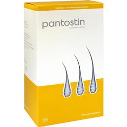 Gelbe und weiße Verpackung eines Haarproduktes mit drei Haarfollikel-Abbildungen.
